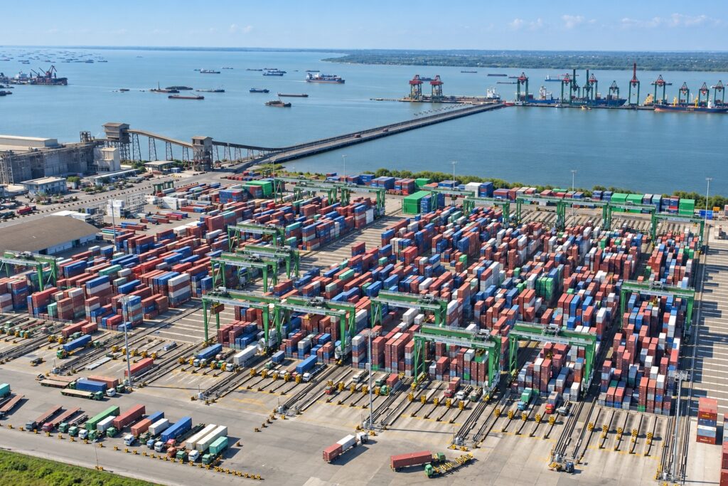 Container terminal with organized stacks, cranes and port transport lanes